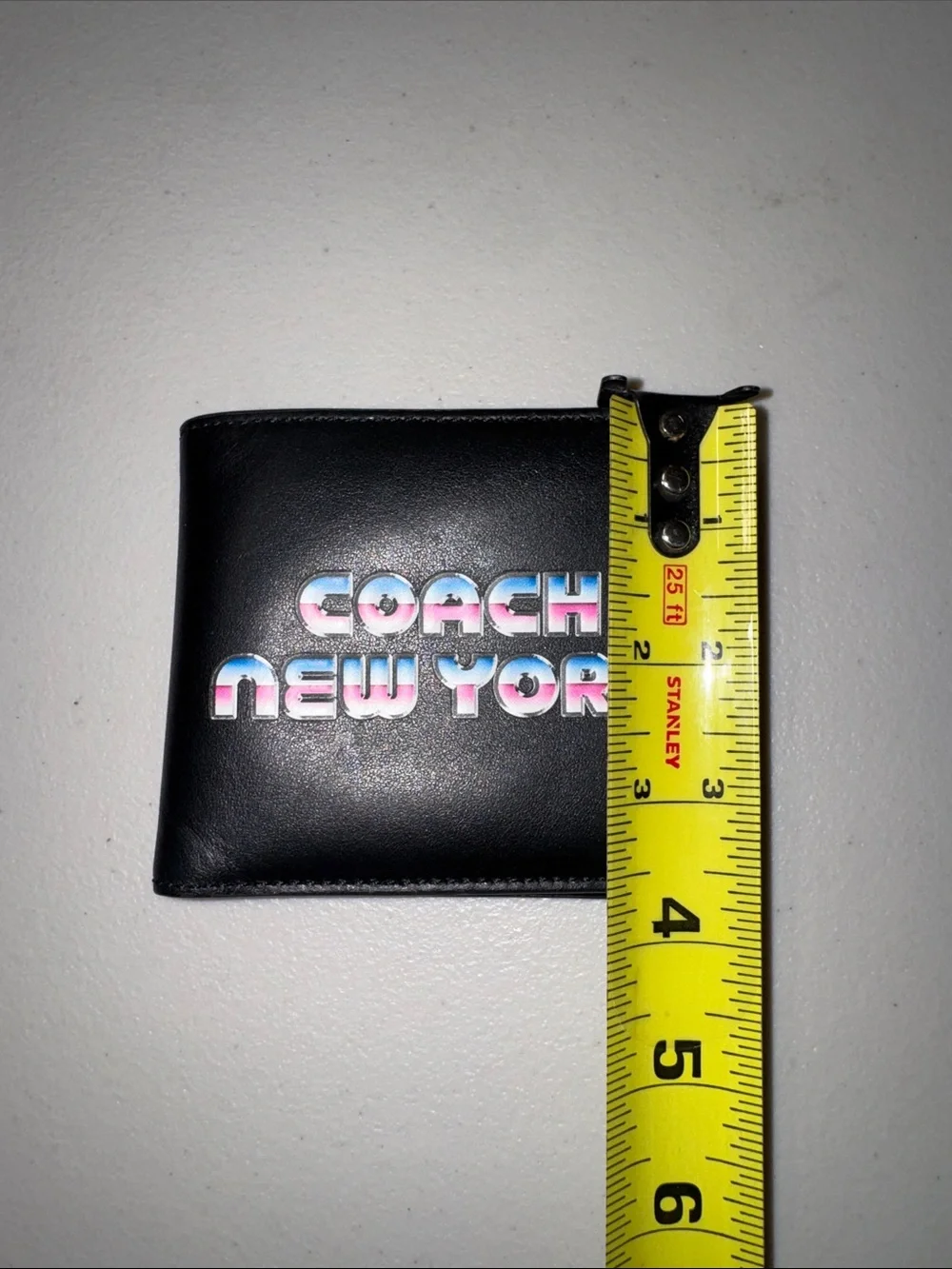Coach Black Leather Bi-Fold Wallet with Multicolor 'Coach New York' Logo